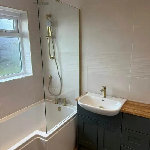 Bathroom renovation tiling by DF Renovate